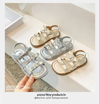 Girls Sandals New 2024 Summer Kids Fashion Bowknot Heart Princess Sandals Party Dress Shoes Children Soft Sole Beach Flats Shoe
