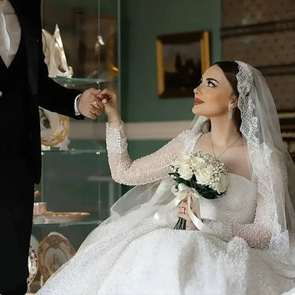 Customized Gorgeous Beaded Sequin Boat Neck Ball Gown Wedding Dresses 2025 Long Sleeves Court Train Tulle Bridal Gowns