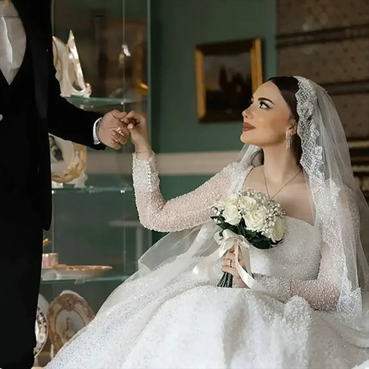 Customized Gorgeous Beaded Sequin Boat Neck Ball Gown Wedding Dresses 2025 Long Sleeves Court Train Tulle Bridal Gowns