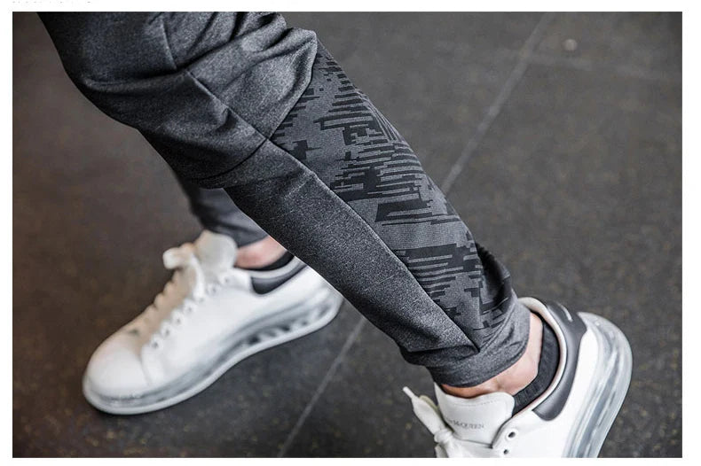 Mens Gym Fitness Running Sweatpants Workout Athletic Long Pants Outdoor Training Sports Trousers Elastic Waist Zipper Pockets