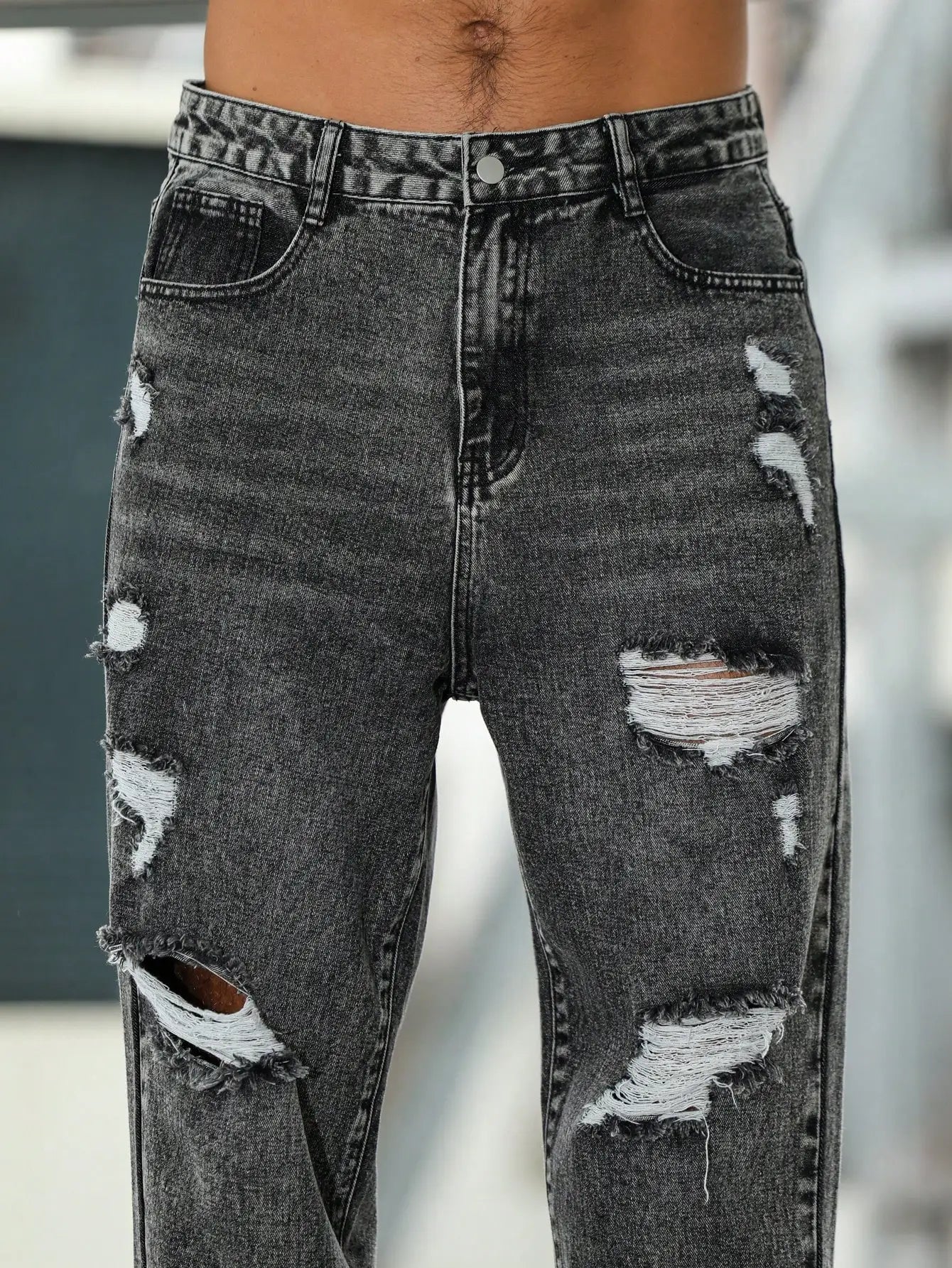 Men's ripped jeans for spring and autumn, dark gray harem pants. Street style. Casual trend.