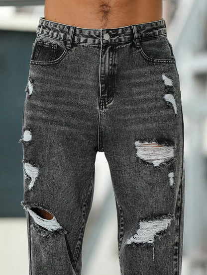 Men's ripped jeans for spring and autumn, dark gray harem pants. Street style. Casual trend.