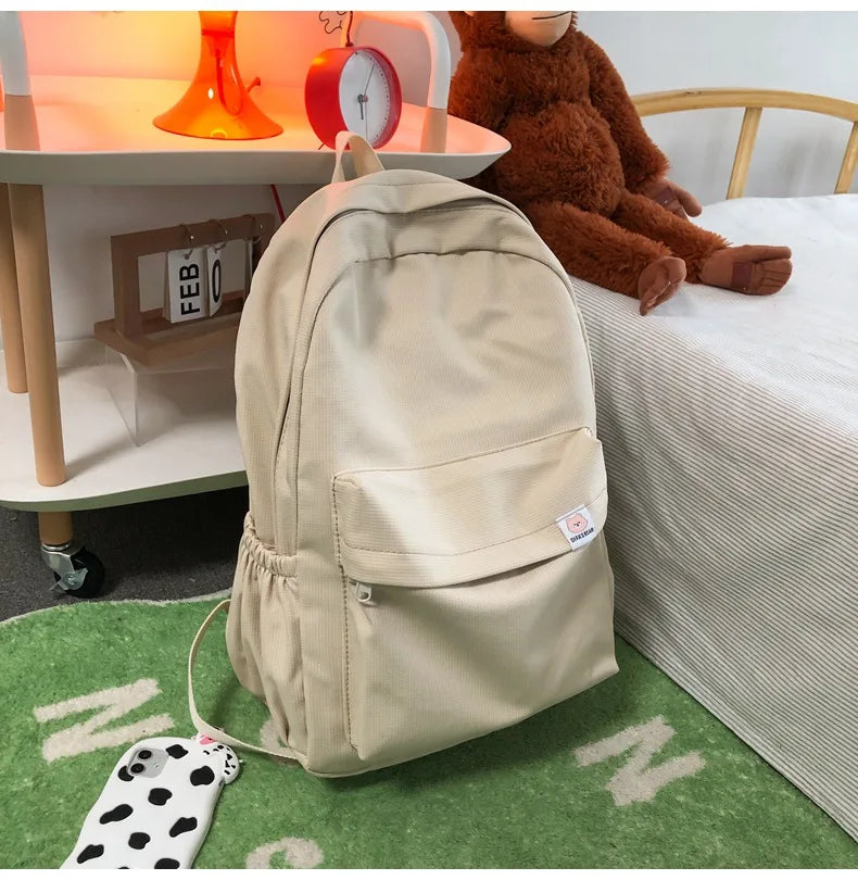 Sweet soft girl solid color large capacity student backpack new style for men and women college students simple trendy