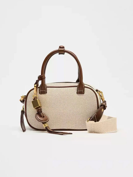 2025 New niche retro color-blocking hand-held small bag, stylish crossbody canvas PU small square bag, single-shoulder bowling b