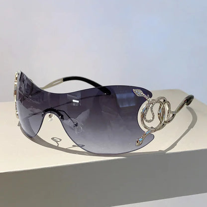 Y2K Rimless Luxury Brand Designer Sunglasses Women For Men One Piece Trendy Oversized Sun Glasses Metal Snake Pink Punk Shades