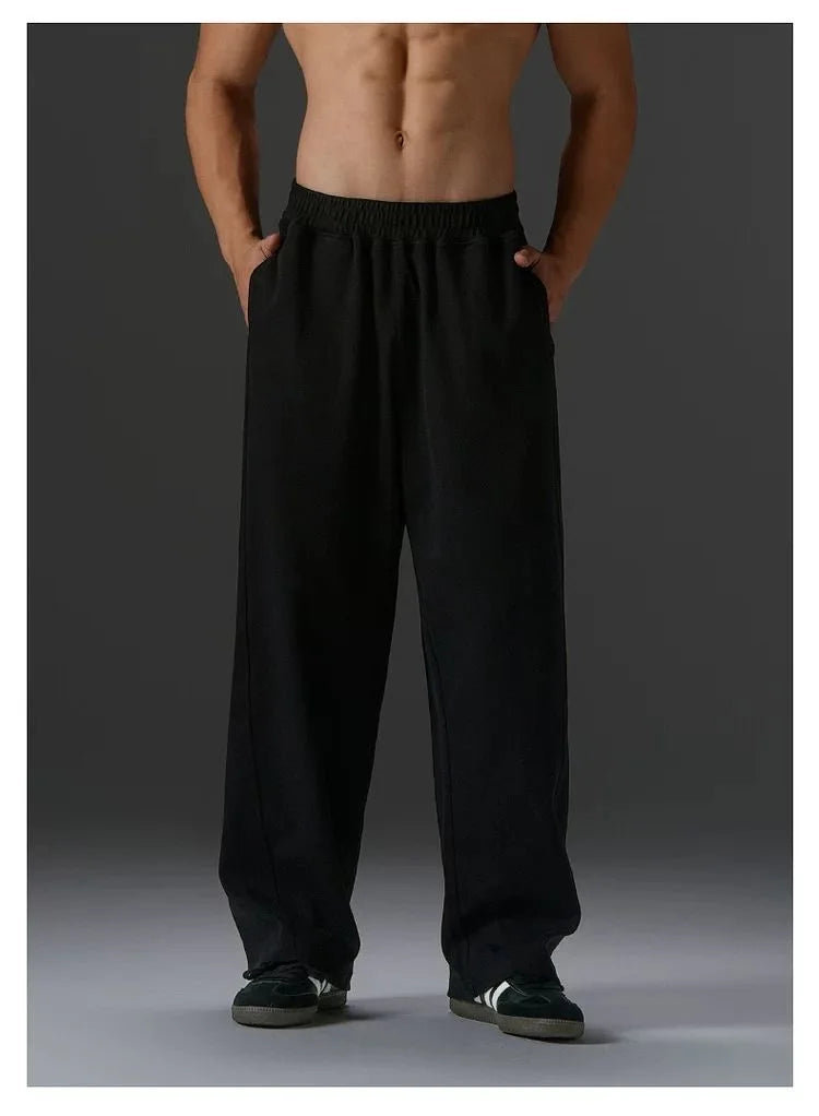 Hot sell Men's Solid Color Blend Sports Pants Elastic Waist Casual Loose Jogging Trousers for Daily Wear And Running