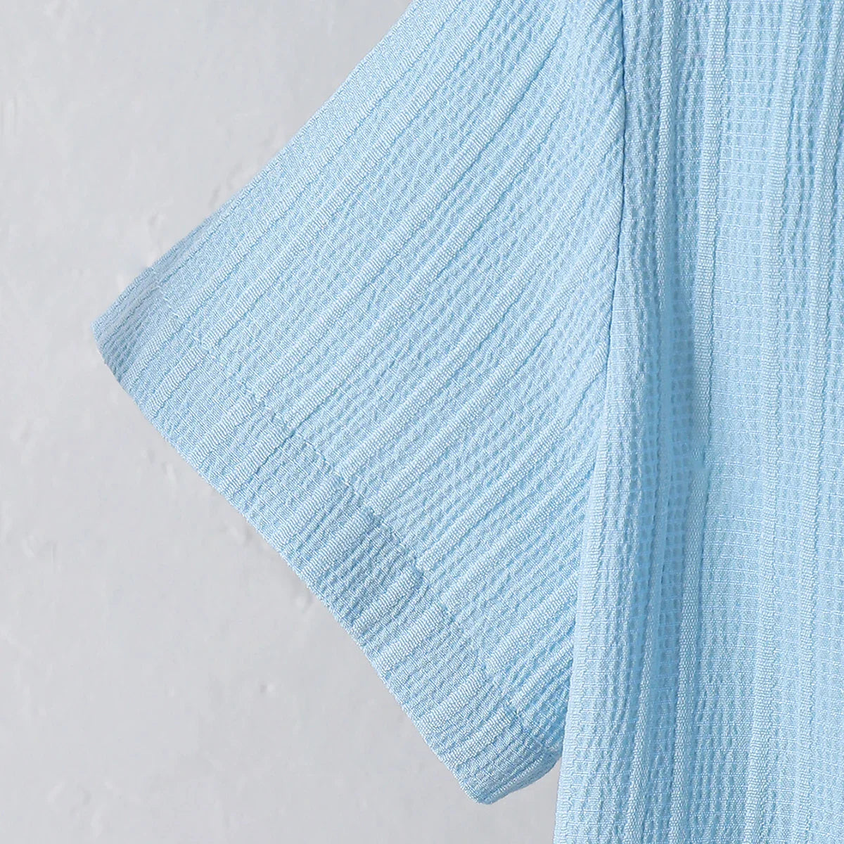 New summer men's short-sleeved woven pure blue button pocket + loose shorts two-piece set