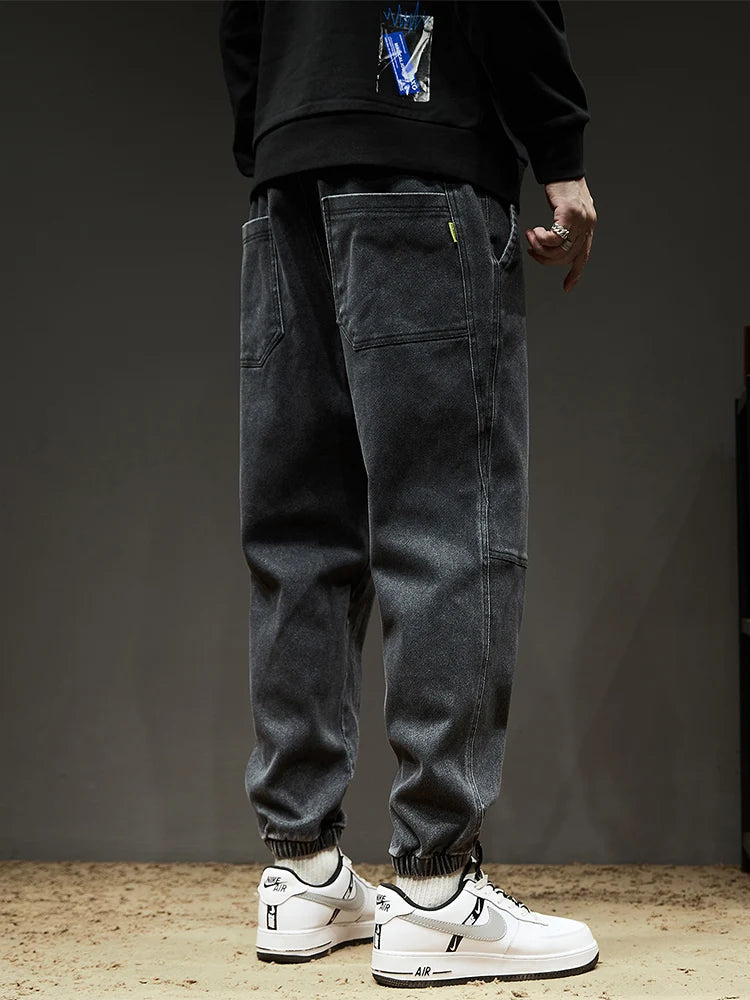 Calça Jeans Masculina Cargo Primavera Verão Levemente Elástica Algodão Denim Jogger Preta Azul Streetwear Folgada