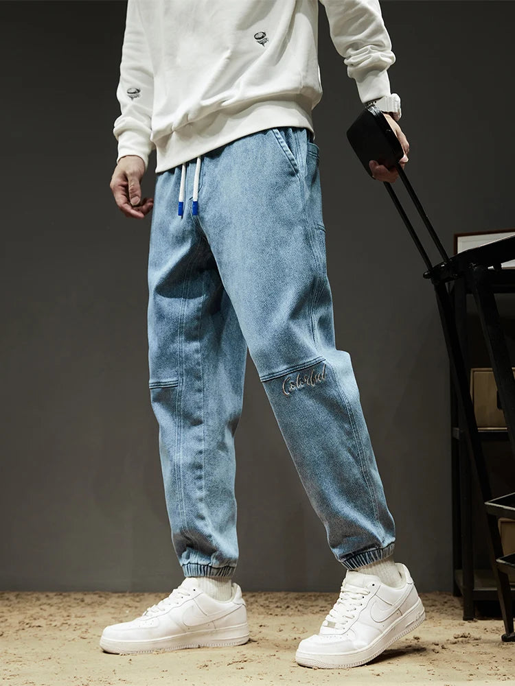Calça Jeans Masculina Cargo Primavera Verão Levemente Elástica Algodão Denim Jogger Preta Azul Streetwear Folgada