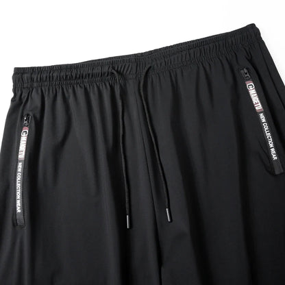 Men's Athletic Stretchy Quick Dry Pants with Zipper Pockets Lightweight Sweatpants for Outdoor Hiking Fishing Running Workout