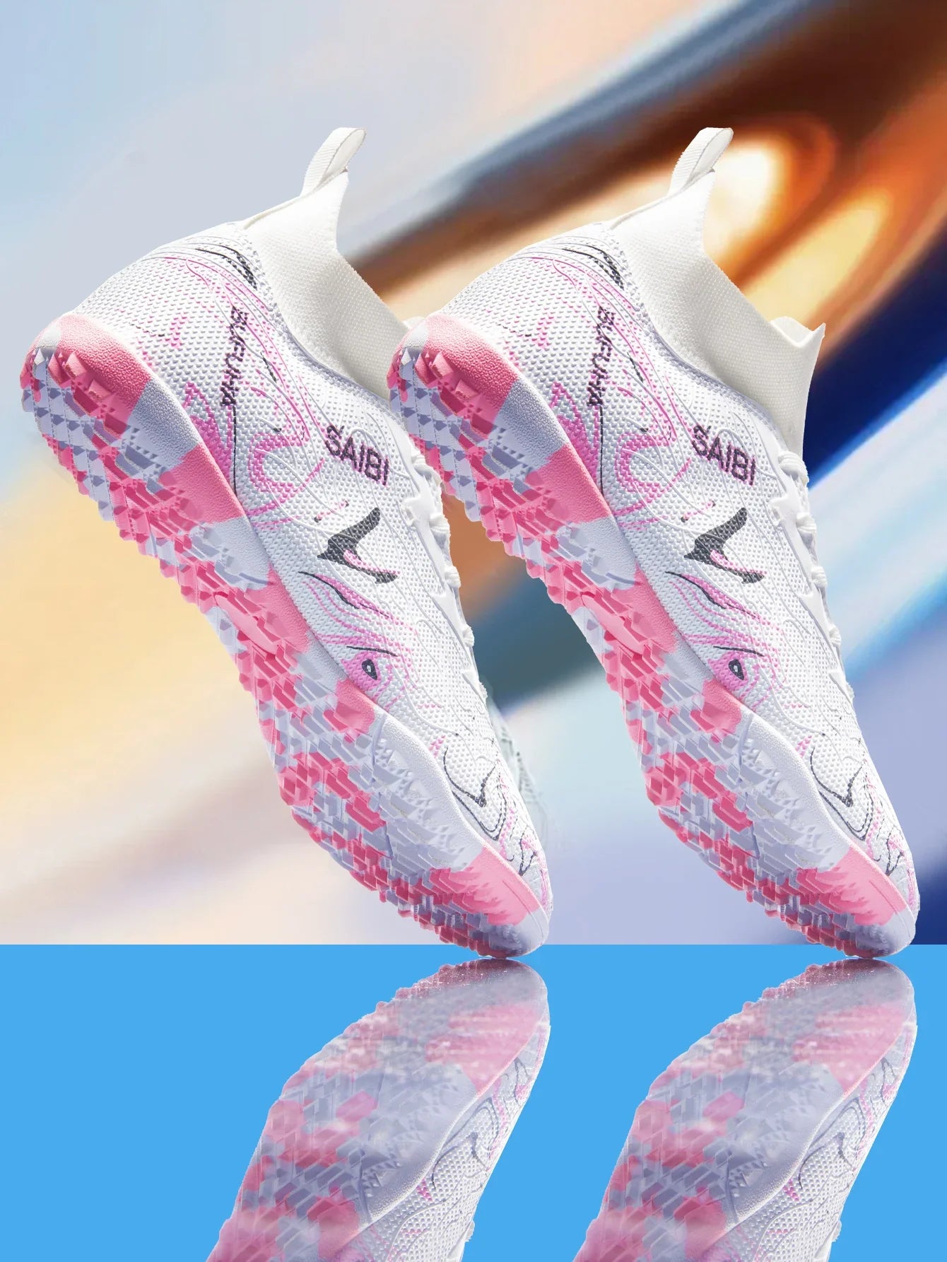 High-top football boots with long FG studs and TF studs,suitable for both men and women,featuring breathable and non-slip design