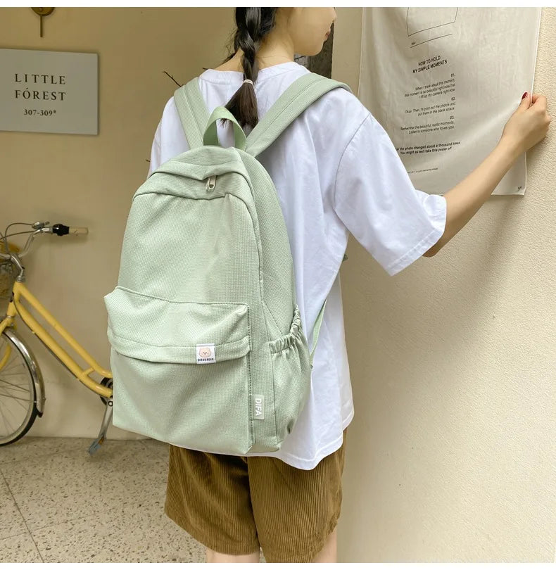 Sweet soft girl solid color large capacity student backpack new style for men and women college students simple trendy