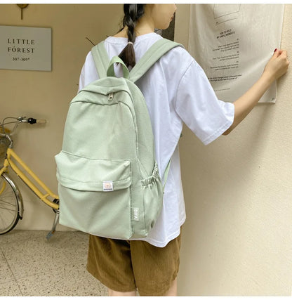 Sweet soft girl solid color large capacity student backpack new style for men and women college students simple trendy