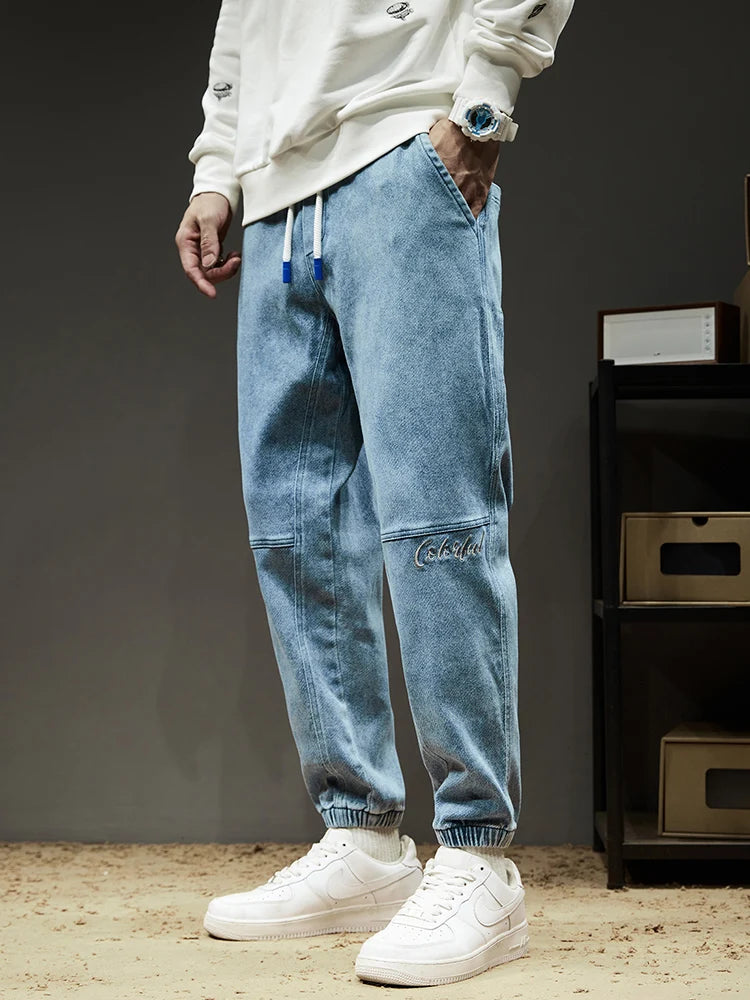 Calça Jeans Masculina Cargo Primavera Verão Levemente Elástica Algodão Denim Jogger Preta Azul Streetwear Folgada