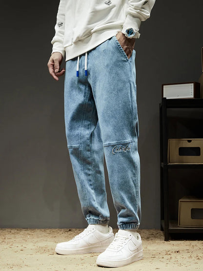 Calça Jeans Masculina Cargo Primavera Verão Levemente Elástica Algodão Denim Jogger Preta Azul Streetwear Folgada