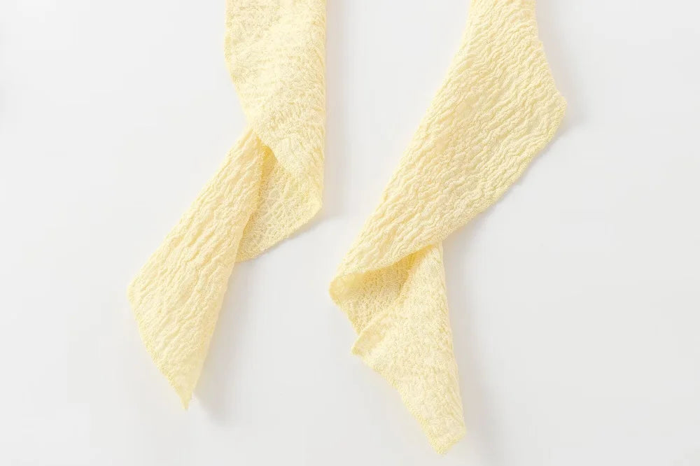 Textured halter crop top with ruffles Women's short yellow sleeveless top with sexy streamers for summer 2025 ETJ