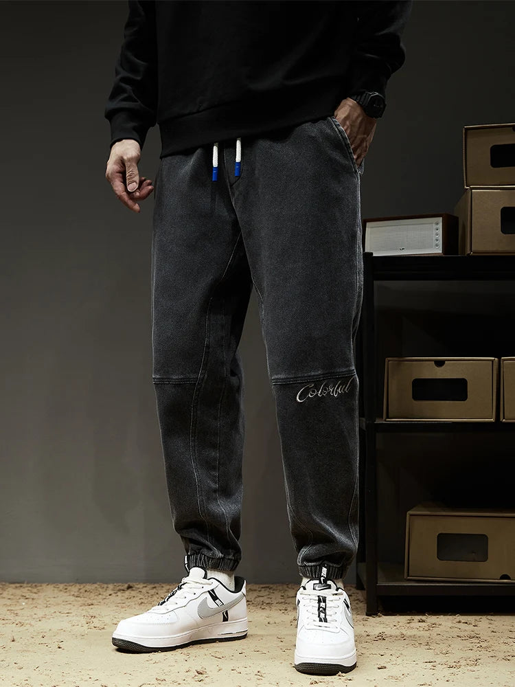 Calça Jeans Masculina Cargo Primavera Verão Levemente Elástica Algodão Denim Jogger Preta Azul Streetwear Folgada