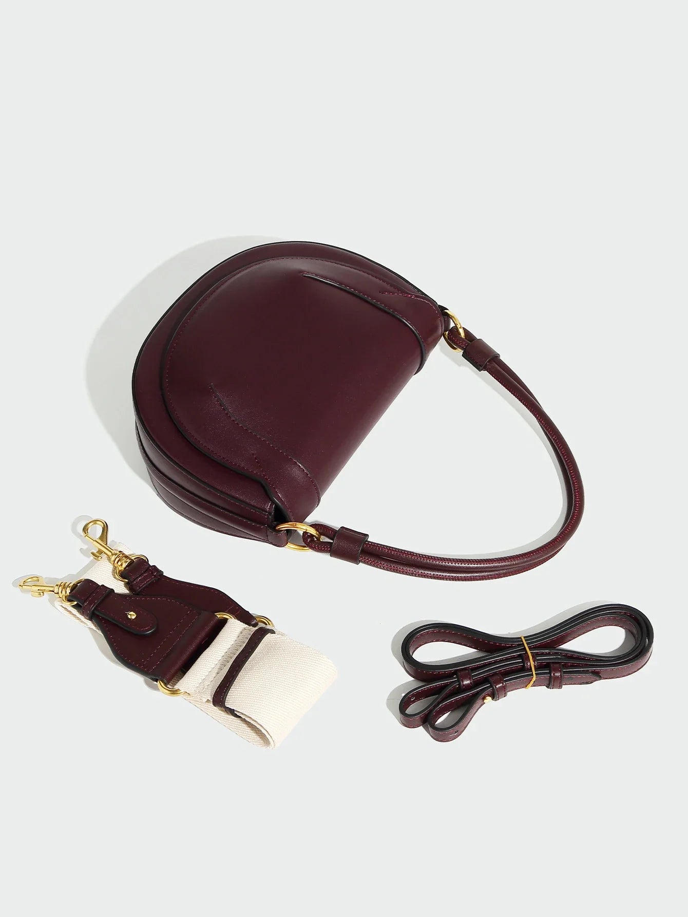 Fashionable and casual hand-held saddle bag, versatile for commuting, single shoulder crossbody bag
