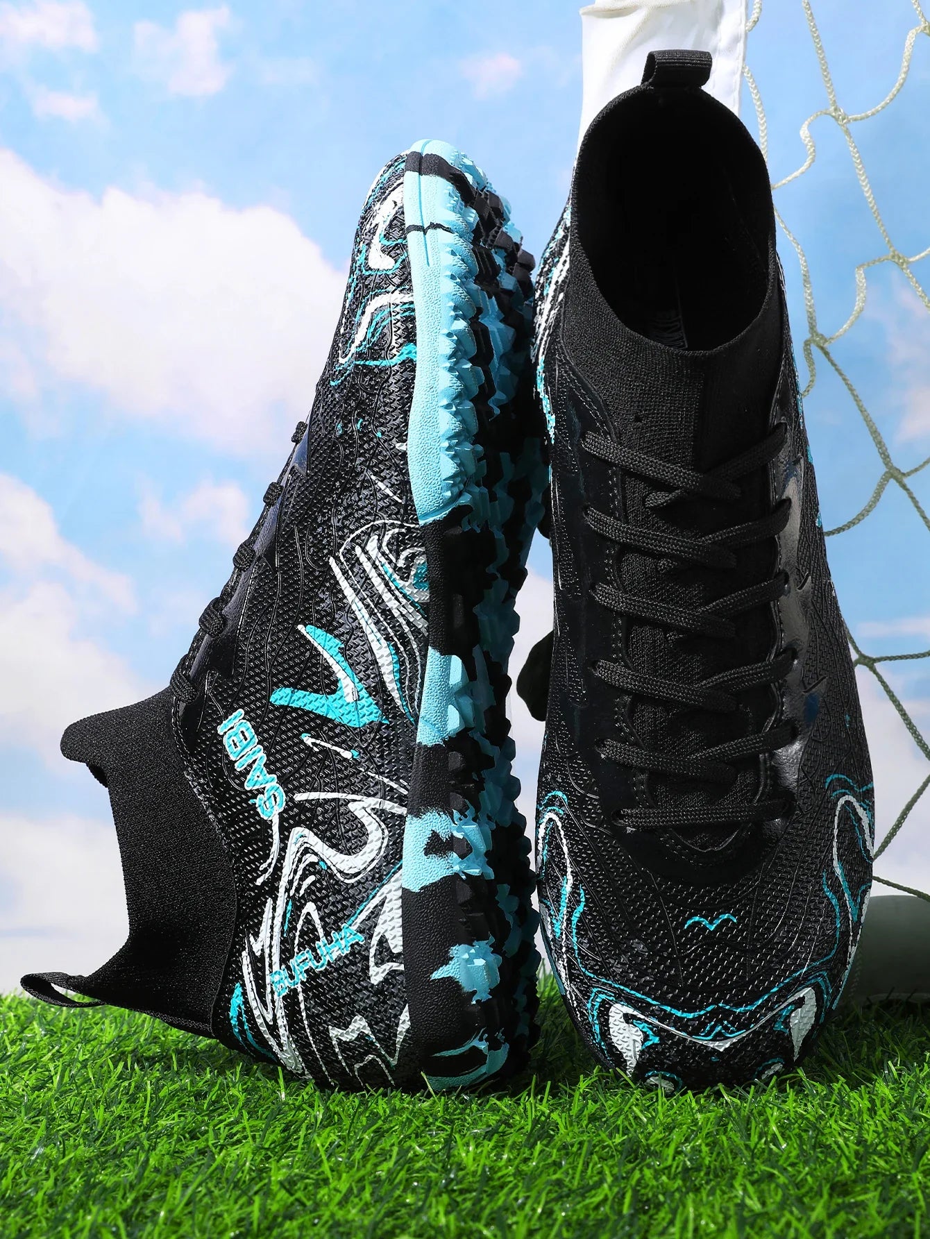High-top football boots with long FG studs and TF studs,suitable for both men and women,featuring breathable and non-slip design