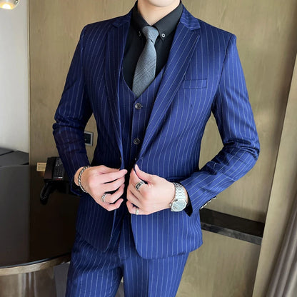 New three-piece suit with tailored striped business suit blazer and trousers set. Korean fashion trend. Stylish wedding attire.