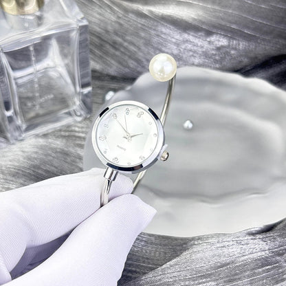 Women's Slim little bracelet 1 large pearl diamond cut glass rhinestone dial Minimalist quartz watch Bracelet Watch