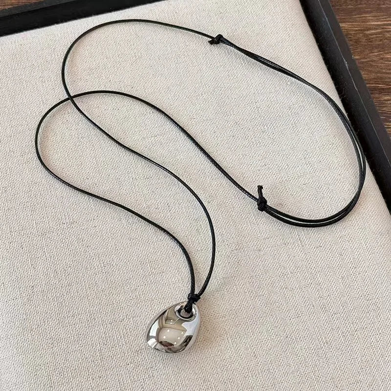 Vintage Irregular Punk Metal Bean Pendant Necklace for Women Adjustable Black Leather Rope Long Clavicle Chain Charm Jewerly