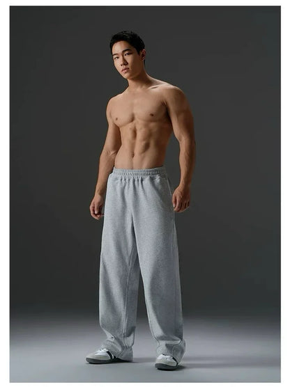 Hot sell Men's Solid Color Blend Sports Pants Elastic Waist Casual Loose Jogging Trousers for Daily Wear And Running