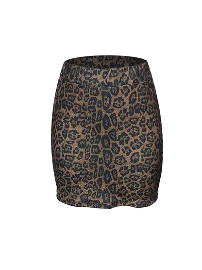 Elegant high-waisted short skirt with a stretch waist in a thousand bird pattern, hugging the hips.