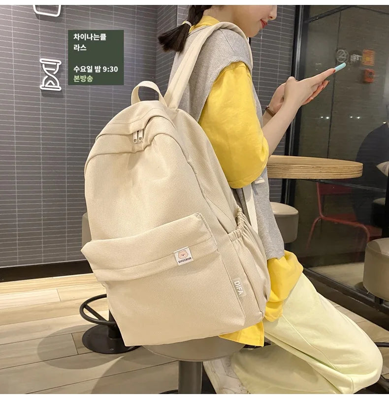 Sweet soft girl solid color large capacity student backpack new style for men and women college students simple trendy