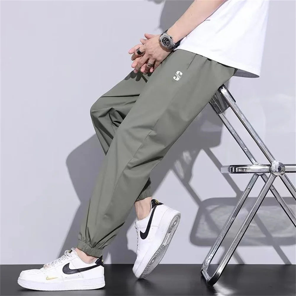 New Ice Silk Pants Men's Fashion Brand Loose Leg Tie Sports Quick Drie 2023 Summer Thin Breathable Cropped Casual Pants