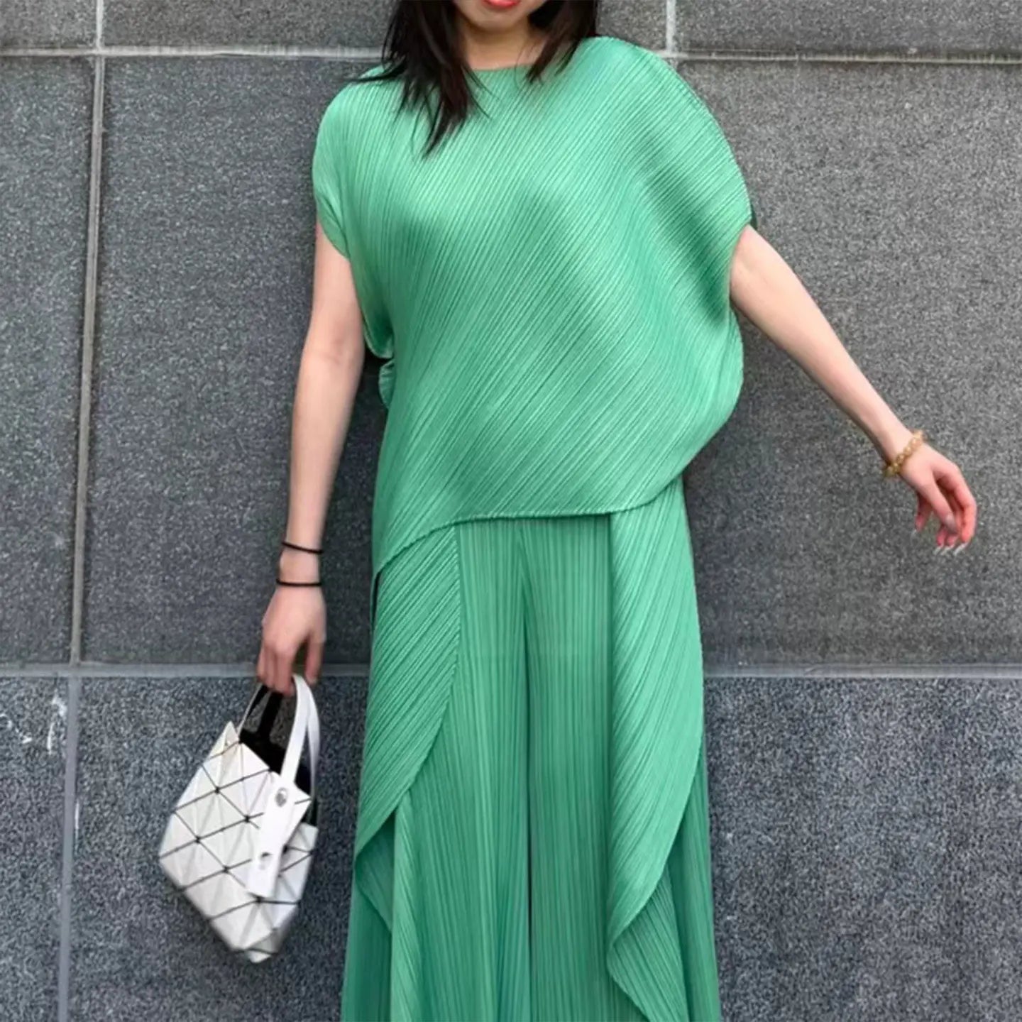Miyake pleated high-end design fashionable irregular solid color round neck top for women