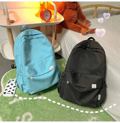 Sweet soft girl solid color large capacity student backpack new style for men and women college students simple trendy