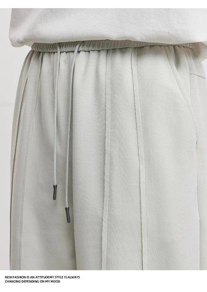 Calças de Moletom Masculinas American Casual Fashion Primavera e Outono 2026 Novas Calças Esportivas Soltas de Camada de Ar Scimitar