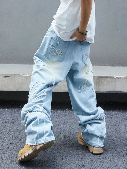 Men's trendy and cool denim wide-leg pants for all seasons featuring unique patchwork patterns, light blue street-stunning style