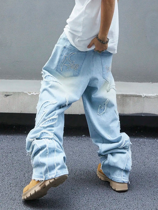 Men's trendy and cool denim wide-leg pants for all seasons featuring unique patchwork patterns, light blue street-stunning style