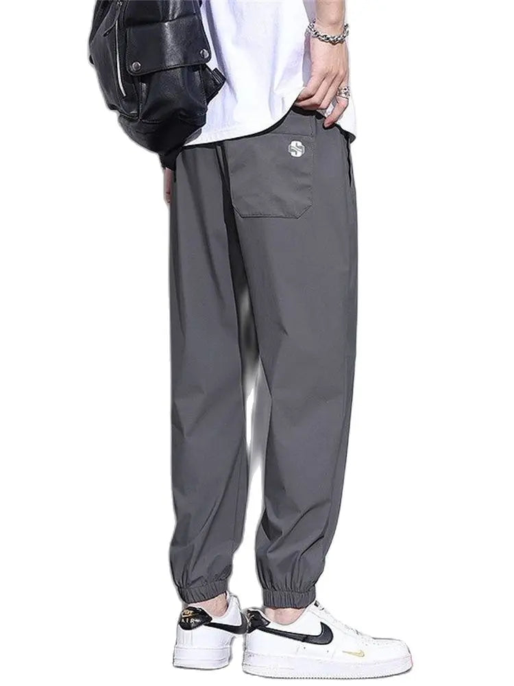 New Ice Silk Pants Men's Fashion Brand Loose Leg Tie Sports Quick Drie 2023 Summer Thin Breathable Cropped Casual Pants