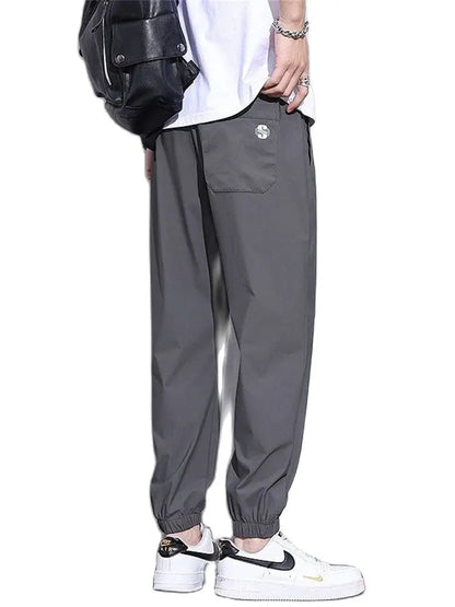 New Ice Silk Pants Men's Fashion Brand Loose Leg Tie Sports Quick Drie 2023 Summer Thin Breathable Cropped Casual Pants