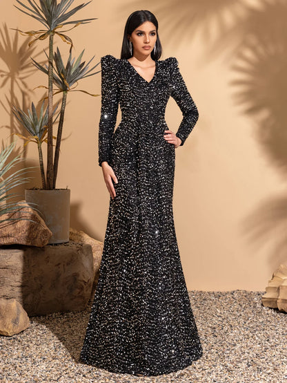 Vestido decote V, de paetê, que marca o quadril, de manga longa, elegante e chique, com cintura justa