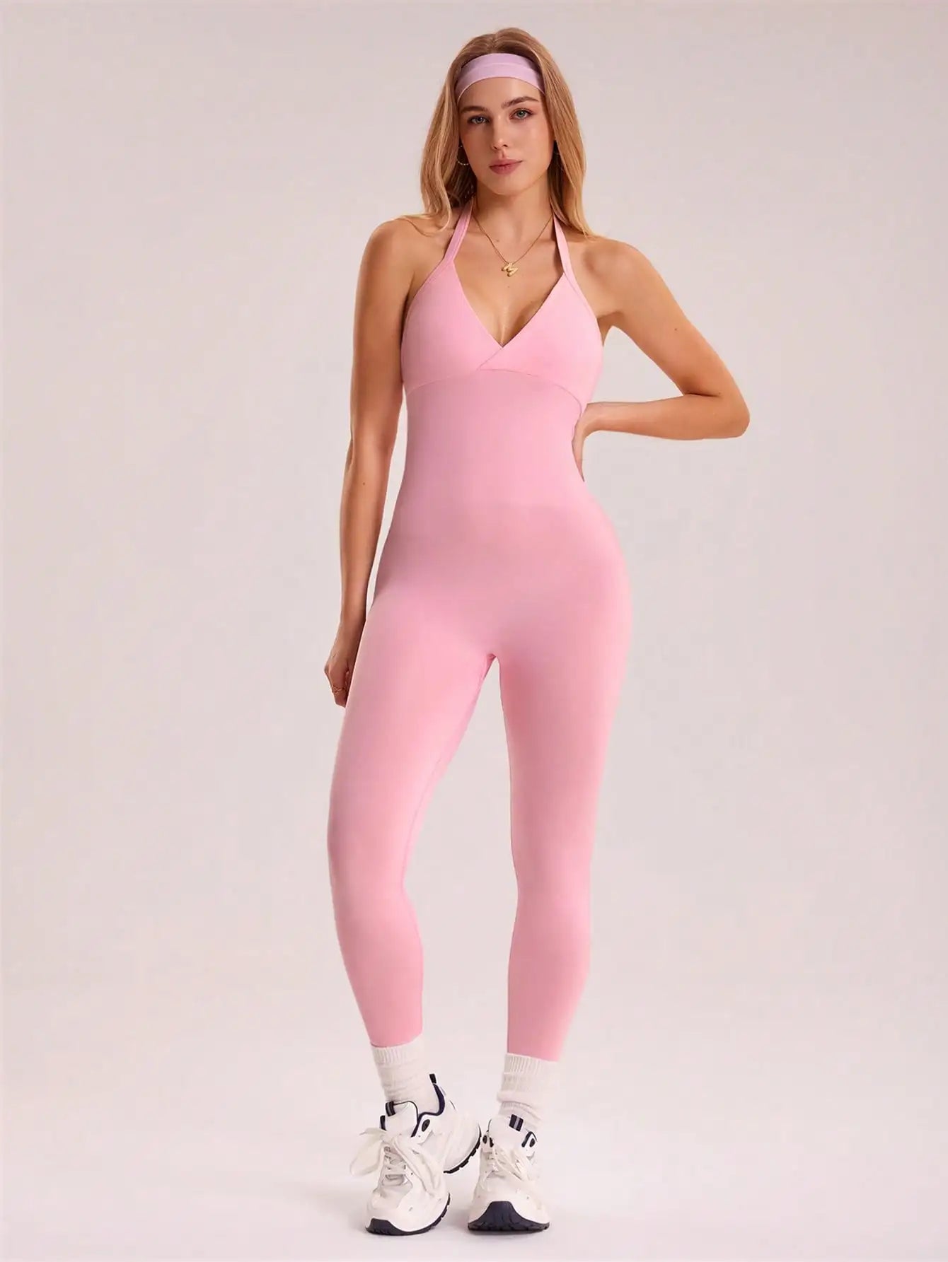 Women's solid color vest style seamless elastic sports jumpsuit with pocket design