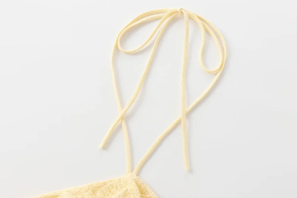 Textured halter crop top with ruffles Women's short yellow sleeveless top with sexy streamers for summer 2025 ETJ