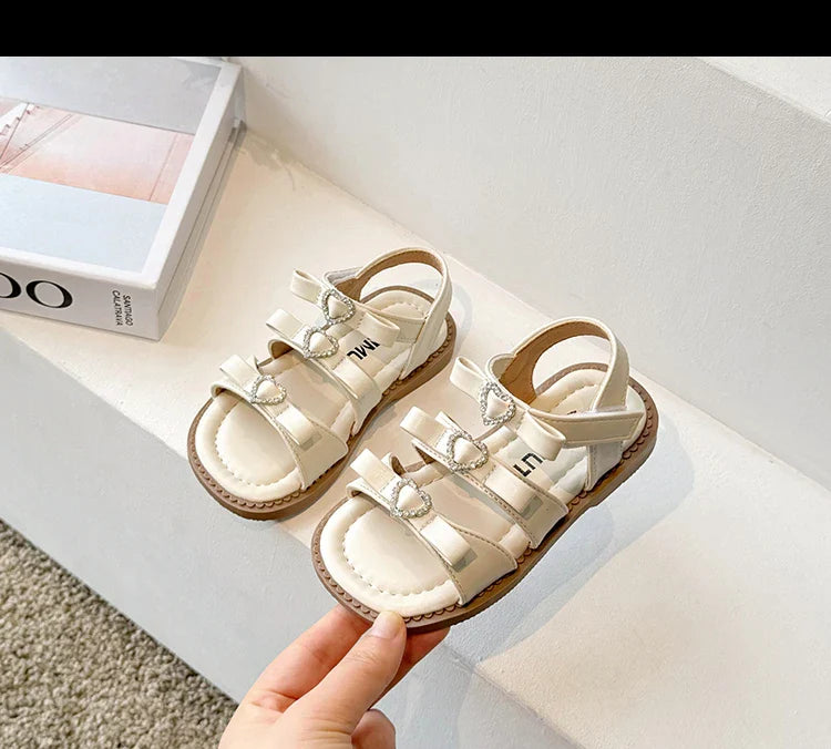 Girls Sandals New 2024 Summer Kids Fashion Bowknot Heart Princess Sandals Party Dress Shoes Children Soft Sole Beach Flats Shoe