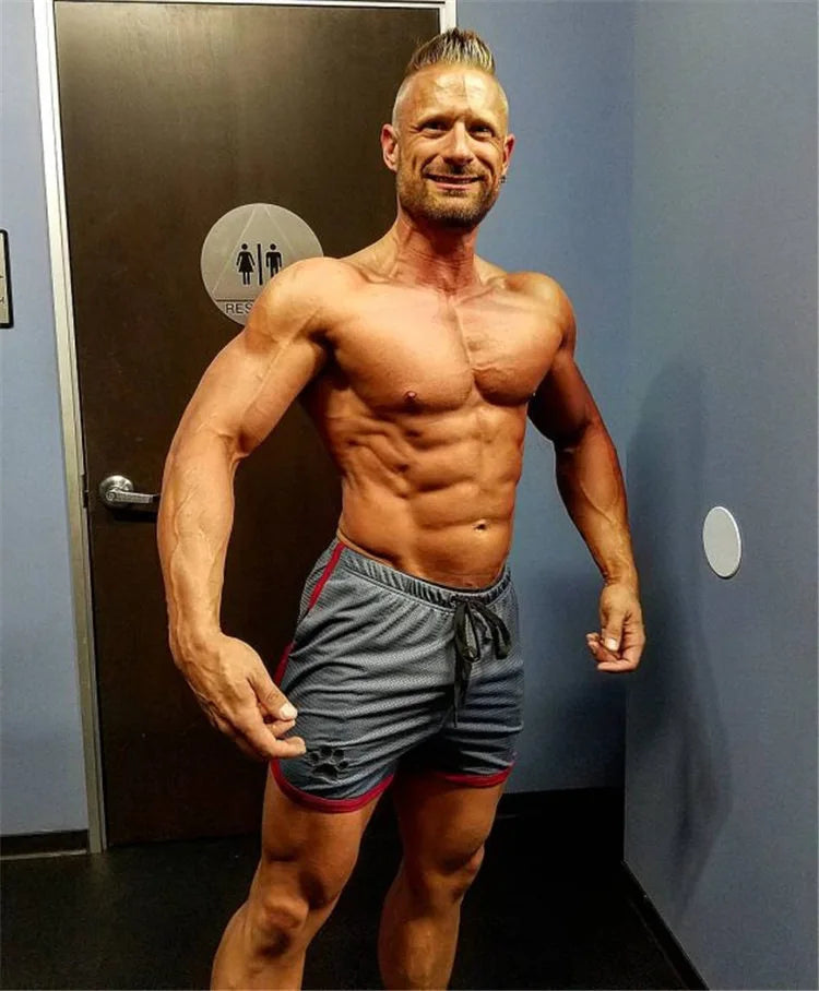 Summer fitness shorts Loose running shorts Men's jogging sports Breathable mesh shorts Thin trend men's three-quarter pants
