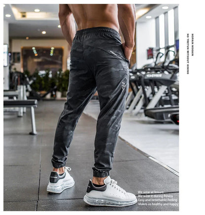 Mens Gym Fitness Running Sweatpants Workout Athletic Long Pants Outdoor Training Sports Trousers Elastic Waist Zipper Pockets