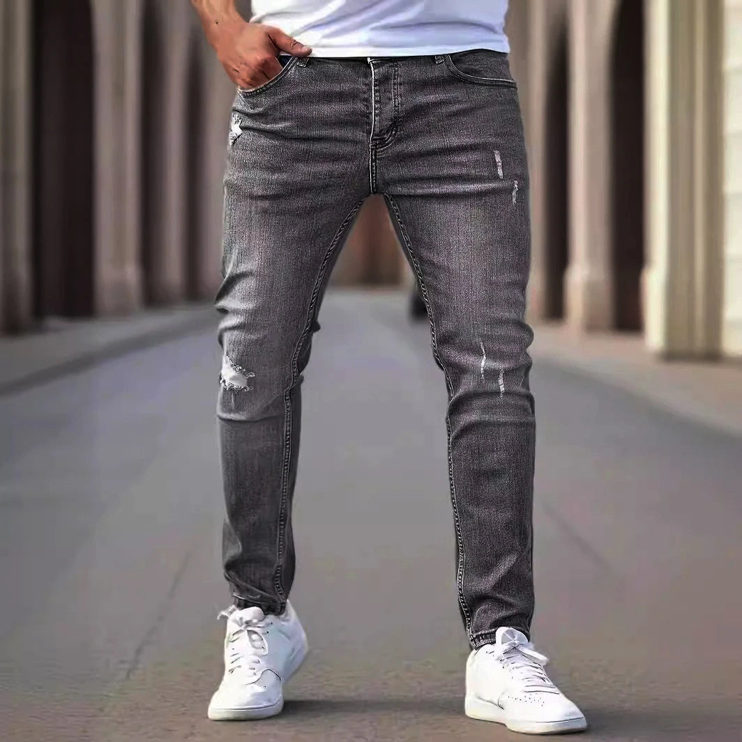 Calça Jeans Masculina Skinny Destroyed Primavera 2026 Lavagem Vintage Elástica Biker com Buracos Casual Ajuste Justo Streetwear Jeans Lápis Jogger