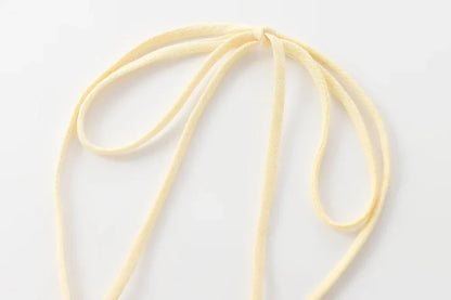 Textured halter crop top with ruffles Women's short yellow sleeveless top with sexy streamers for summer 2025 ETJ