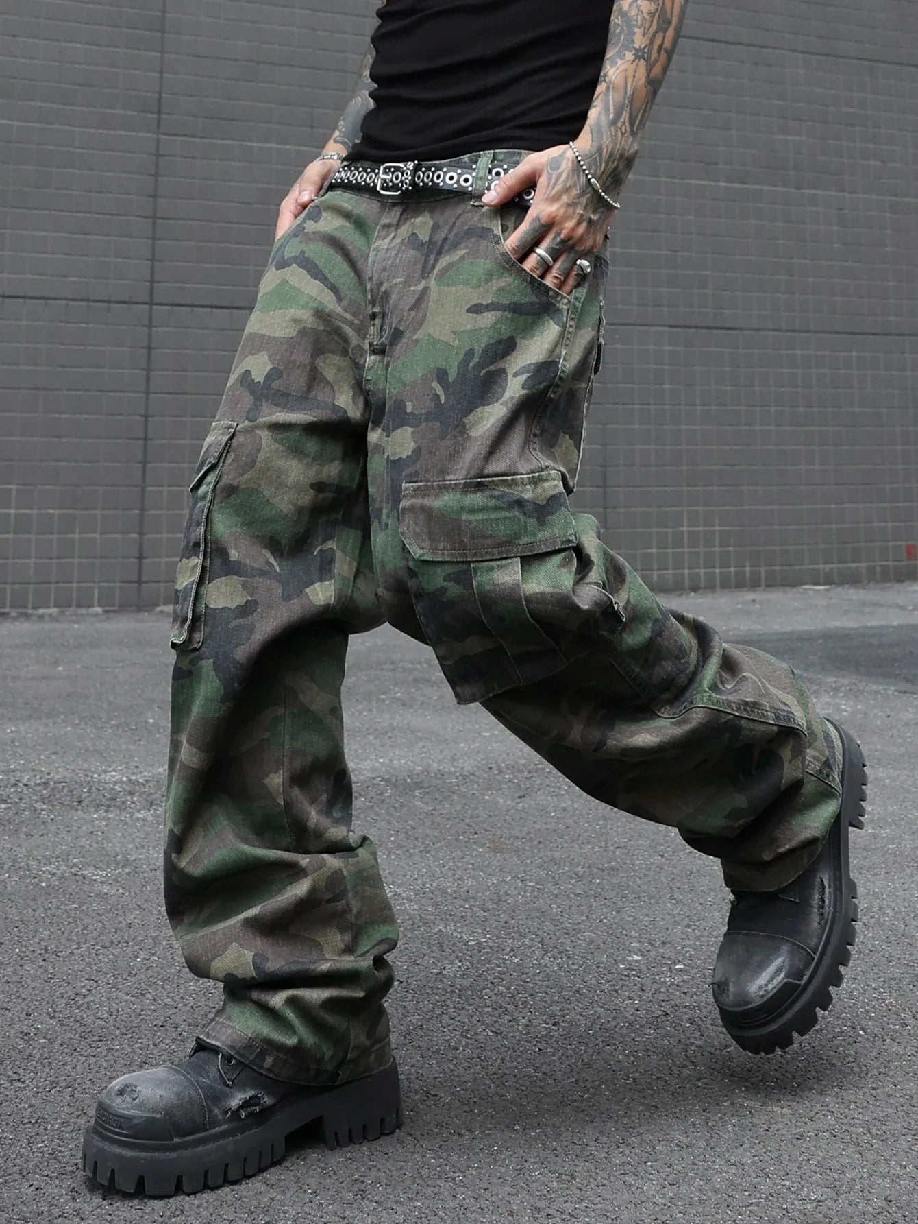 Men's camouflage utility jeans. Multi-pocket design. Stylish and trendy. Loose fit.