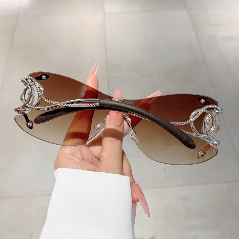 Y2K Rimless Luxury Brand Designer Sunglasses Women For Men One Piece Trendy Oversized Sun Glasses Metal Snake Pink Punk Shades