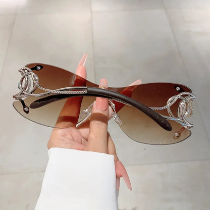 Y2K Rimless Luxury Brand Designer Sunglasses Women For Men One Piece Trendy Oversized Sun Glasses Metal Snake Pink Punk Shades