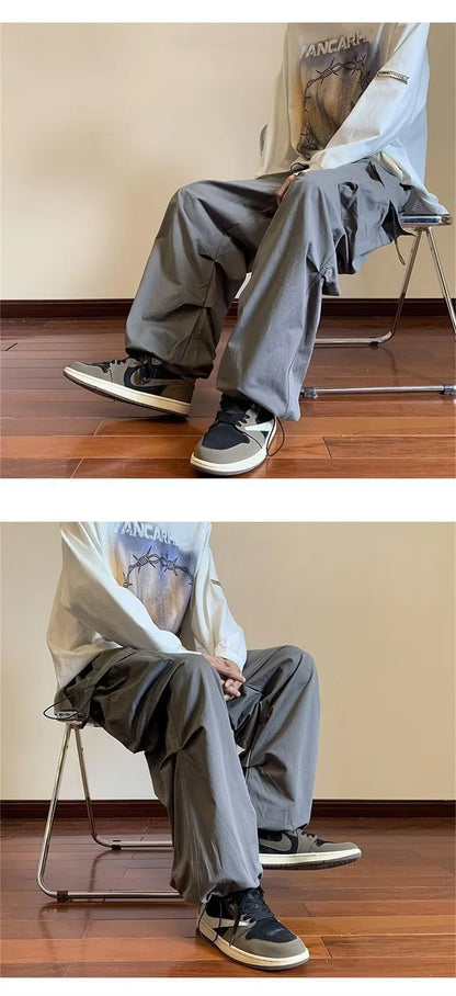 Streetwear 2025 New Spring Harem Multicolored Casual Pants Men Elastic Waist Solid Color Cargo Pants Multi Pocket Baggy Pants