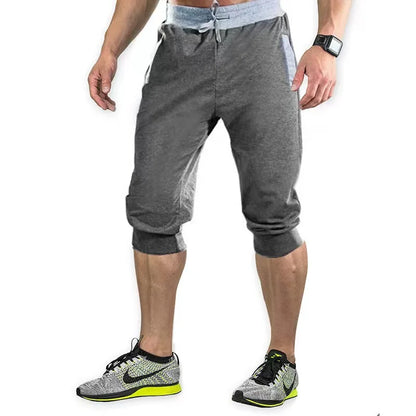 2025 new men's sports pants men's casual jogging shorts elastic fitness pants seven quarter pants casual M-3XL men